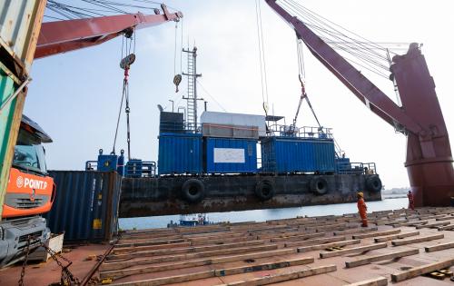 Sealand Shipping Triumph with Seamless Barge Load